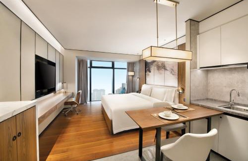 Jiangxia District Hotel | 武汉光谷豪生酒店