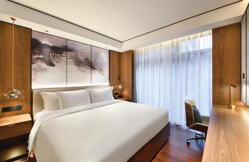 Jiangxia District Hotel | 武汉光谷豪生酒店