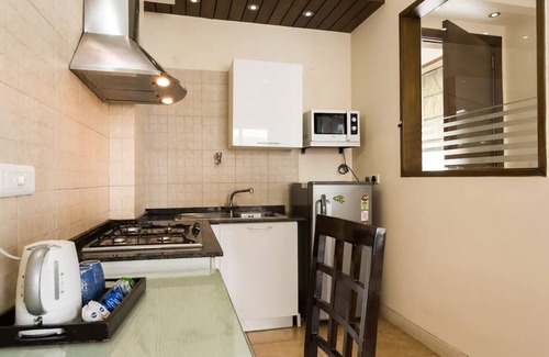Sector 40 Bed & Breakfast | 1 BHK Serviced Apartment in awarded BnB Property