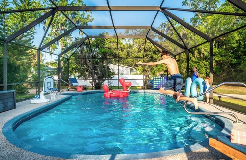 Palm Coast House | 1 Min Private Beach & River Access w Movie Room, Heated Pool, Kayaks & Game Room