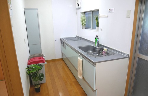 Konohana House | 1 minute walk from the station in a good location! Accommodates 20 people! Rooftop BBQ available! 5 bedrooms, spacious 140 sq.m! By train: 5 minutes to Univa, 10 minutes to Namba, and 5 minutes to Umeda!