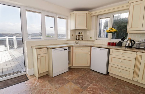 Menai Bridge Cottage | 11 GLYN GARTH MEWS, pet friendly, with a garden in Llandegfan