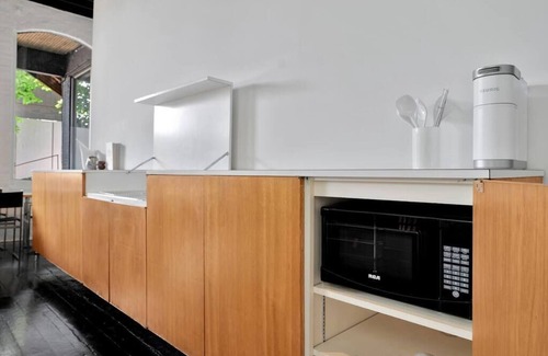 Champaign Apartment | 1960's Mid-Century Modern Loft w/Original Furniture