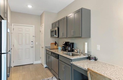 Southport Condo | 1BR/1BA Hotel Room - Pool, Elevator, Sleeps 4