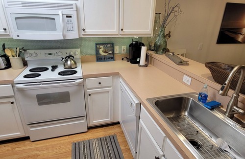 Bolivia Condo | 1st floor Winding River 2 bed condo withnBeach house on Holden!