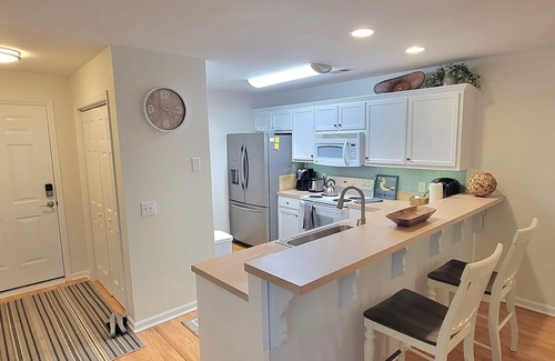 Bolivia Condo | 1st floor Winding River 2 bed condo withnBeach house on Holden!