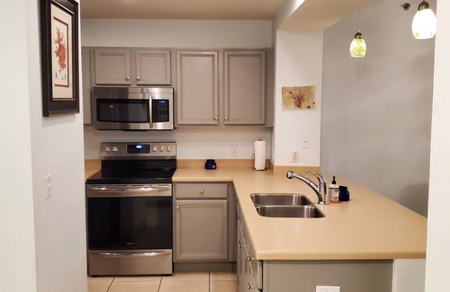 Waterside Village Condo | 2/2 Waterside Villas Condo 4th Floor w/Canal Front boat docking & Gulf Views