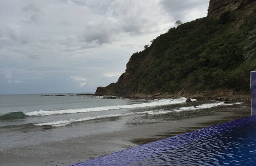 San Juan del Sur Condo | 2 bed 2 bath, full kitchen, OCEAN FRONT, balcony A/C, pool, internet, cable TV
