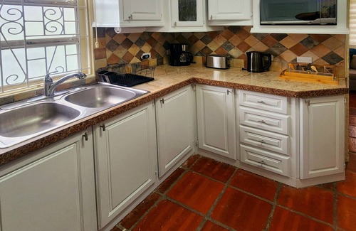 Oistins House | 2 Bedroom Garden Oasis near Beach, Airport, Nightlife