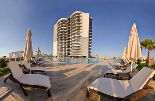 Trikomo Apartment | 2-bedroom hotel apartment with pool , gym, sauna, spa in iskele