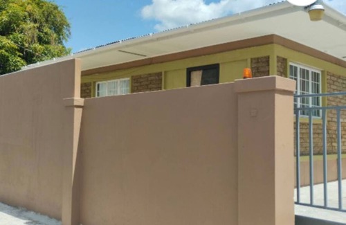 Woodbrook House | 2-bedroom house in awesome POS walking distance to everything -WiFi, AC included
