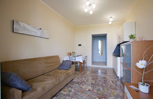 Carciano Apartment | 2-room apartment with terrace in an Art Nouveau villa with communal pool
