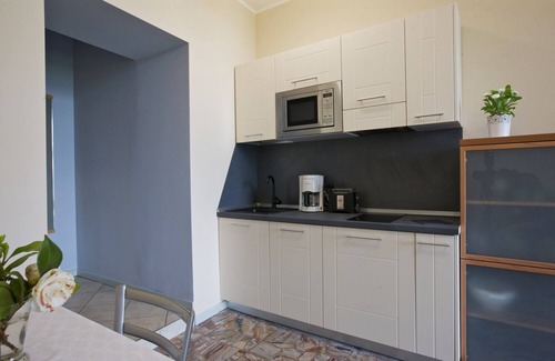 Carciano Apartment | 2-room apartment with terrace in an Art Nouveau villa with communal pool