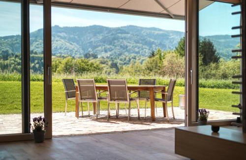 Eibiswald House | 2 stilvolle Ferienhäuser Südsteiermark ruhige Lage top Aussicht & Wallbox