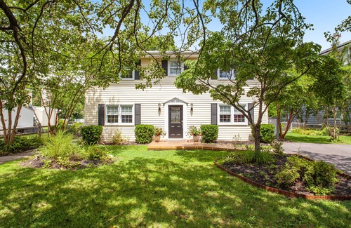 Edgewater House | 2-story, riverfront home with private dock, inviting deck & dog-friendly yard