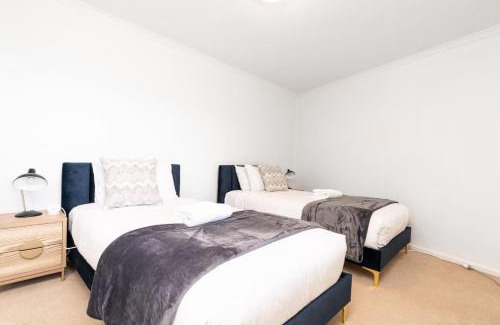 Griffith Apartment | 2BR 2BA Apt with Dedicated Workspace and Free parking - Hosted by CanStay
