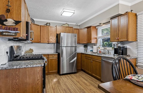 Cadiz House | 3 bedroom/2 full bath lakefront home with gentle slope to private covered dock