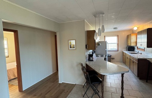 Smyrna Cottage | 3-bedroom cottage on beautiful Big Pine Island Lake. Sandy beach, huge deck.