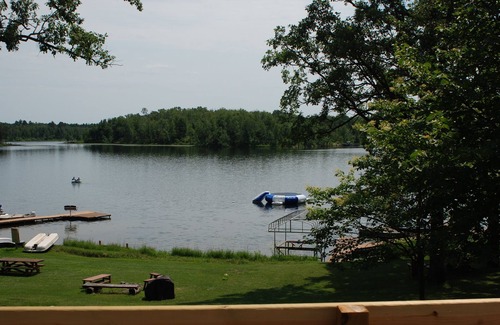 Nevis Cabin | 3 BR Cabin Surrounded by Pines on Fishing/Swimming Lake