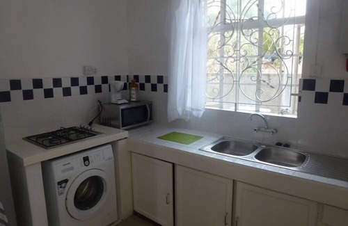 Flic-en-Flac Apartment | 300 metres from the beach - air-conditioned apartment - all comforts - TV - WIFI