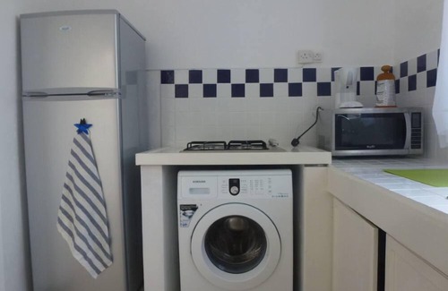 Flic-en-Flac Apartment | 300 metres from the beach - air-conditioned apartment - all comforts - TV - WIFI