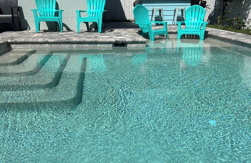 New Smyrna Beach House | 3rd house from beach with heated pool & tiki bar. 2 master suites + 2 bedrooms.