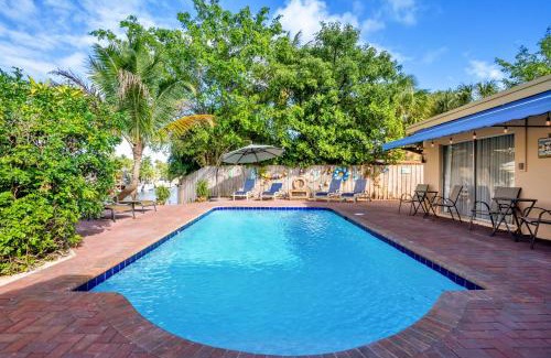 Garden Isles House | 4 bd Near beach spacious solar heated pool waterfront home