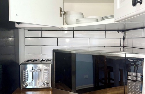 Grand Boulevard Apartment | 4-bedroom apartment in marvelous Chicago with Workout Mirror, AC