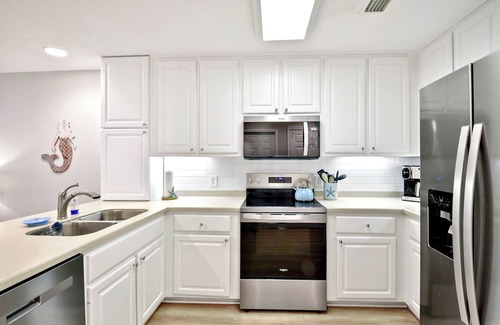 Demere Park Condo | 4 bedroom condo. Community pool. Close to pier/village area and beach.