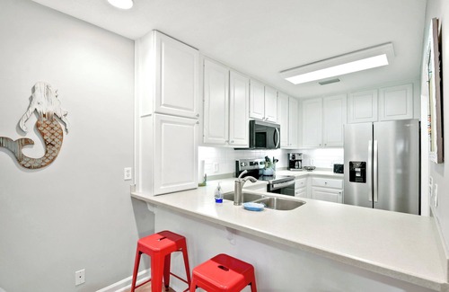Demere Park Condo | 4 bedroom condo. Community pool. Close to pier/village area and beach.