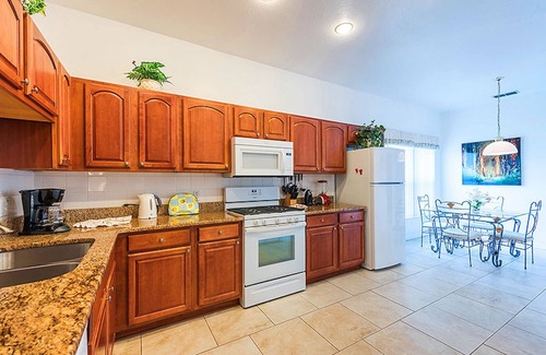 Crescent Lakes House | 4 Bedroom√ Gated√ On Lake√ Big Pool-Sun Deck√ Solar Heated√ Easy for Parks√