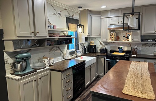 Oshkosh House | 4-bedroom house in charming Oshkosh with AC, WiFi, and main floor laundry.