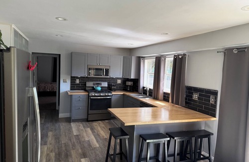 Fort Gratiot House | 4-bedroom house on the Black River in Fort Gratiot. Dock your boat out back!