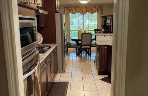 Port Arthur House | 4- Bedroom Serenity: 8 Beds Your Peaceful Retreat: Television in Every Bedroom