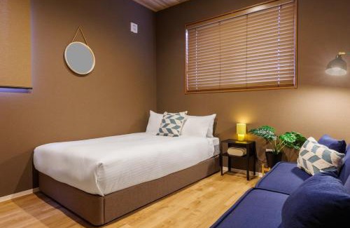 Hamagawa House | 4 minutes by car to American Village Free parking included Accommodates up to 16 people Spacious house tocoa