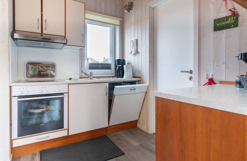 Norderteil House | 4 person vacation home with sauna, wood-burning stove and a beautiful garden with terrace in Otterndorf