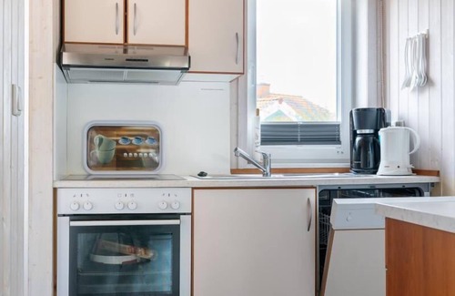 Norderteil House | 4 person vacation home with sauna, wood-burning stove and a beautiful garden with terrace in Otterndorf