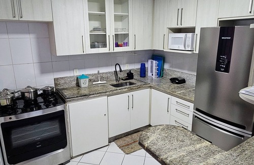 Praia do Morro Apartment | 4 suites facing the sea with barbecue, 2 parking spaces, Wi-Fi