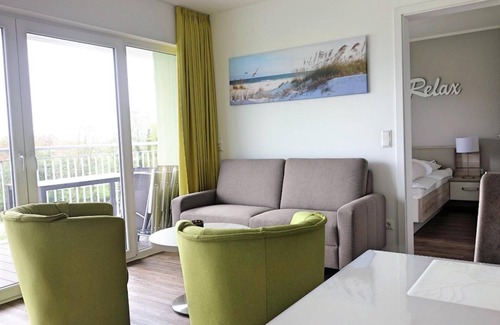 Schillig Apartment | 48.3.M Seestern - Modern vacation apartment, infrared cabin, close to the beach, large
