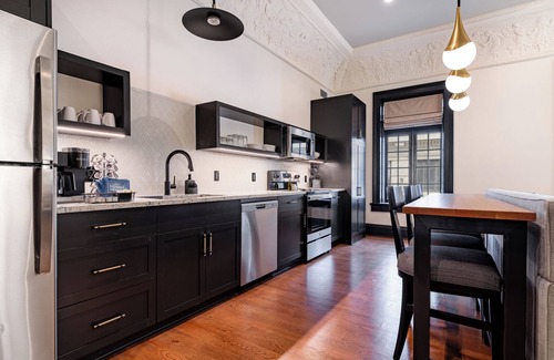 Central Business District Hotel | 4BR 2-Story Historic Space Steps from French Quarter | The Mayfair