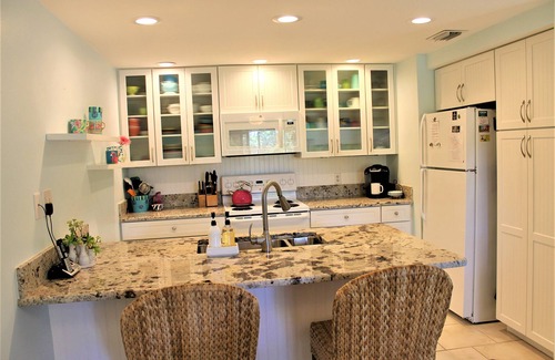 Boca Grande Condo | 50 steps to a seven mile ,not crowded beach. See our pics for views and decor!