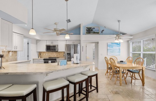 Mid Island House | 5550 Palmetto Paradise: 3BR w/ Gulf Views, Heated Pool