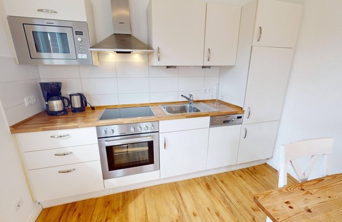Pelzerhaken House | 6-person vacation home close to the beach with garden, beach chair, terrace, dog and garden.