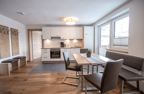 Bichlbach Apartment | 60 m² modern vacation apartment with balcony, free bathing lake, 100 m to the ski area