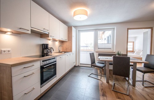 Bichlbach Apartment | 60 m² modern vacation apartment with balcony, free bathing lake, 100 m to the ski area