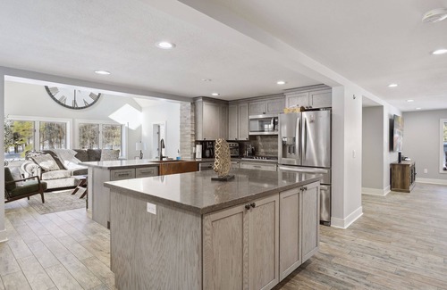 Amery Cabin | 6000 sqft Log Cabin - Nestled on 53 acres -ski out access. 10 min from the lake!