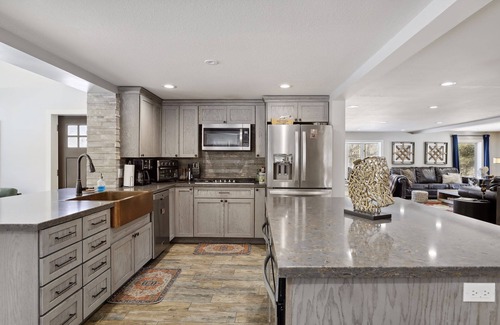 Amery Cabin | 6000 sqft Log Cabin - Nestled on 53 acres -ski out access. 10 min from the lake!