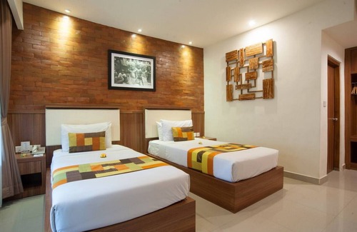 Downtown Kuta Hotel | A Balinese architecture hotel room near the beach of Kuta, WH1