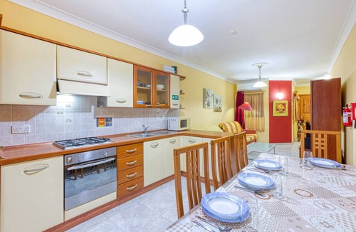 Bugibba Apartment | A colourful 3BR home, with Smart TV & Balcony