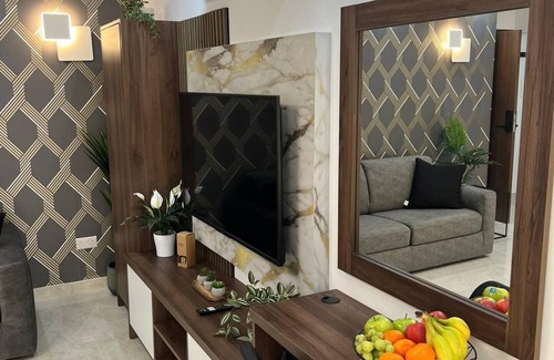 Bugibba Apartment | A modern apartment block in the heart of Bugibba. All one-bedroom flats, stylishly finished and fully equipped with comfort, ideally located close to shops, services, and all amenities.